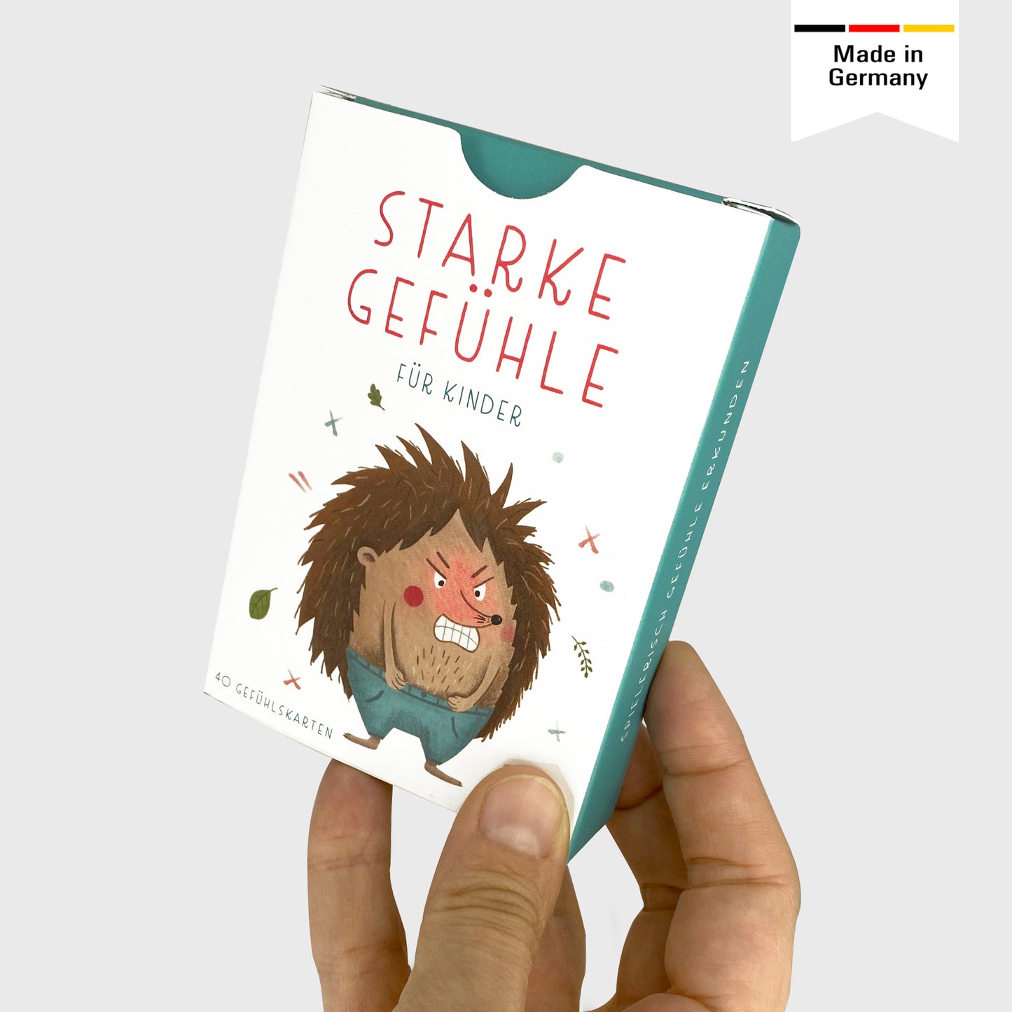 Handgezeichnetes Kartenset mit Gefühlskarten: 40 Karten mit bunten Illustrationen und kindgerechten Beschreibungen von Gefühlen, verpackt in einer Faltschachtel, ideal für die Förderung emotionaler Kompetenz.